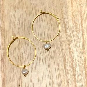 Delicate freshwater pearls on 18k stainless steel hoops